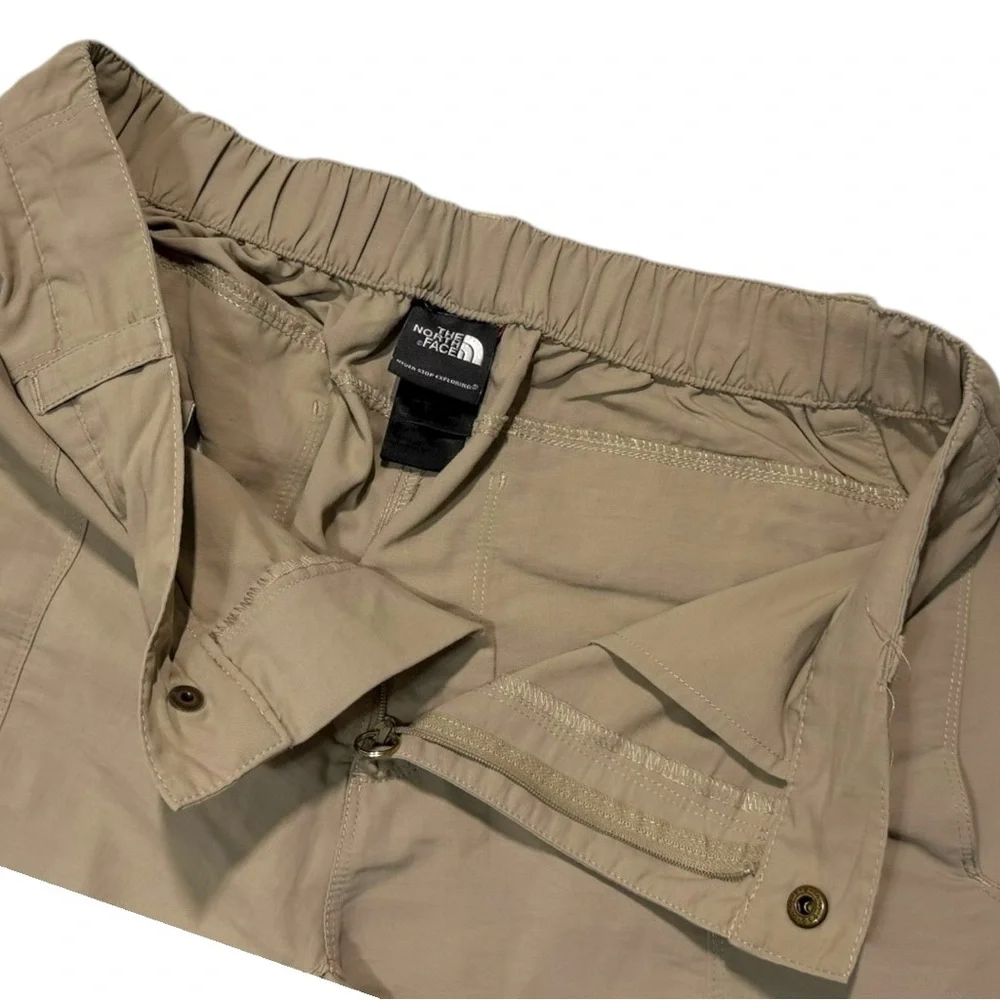 The North Face convertible cargo‎ hiking pants in a beige or tan color Men’s - M